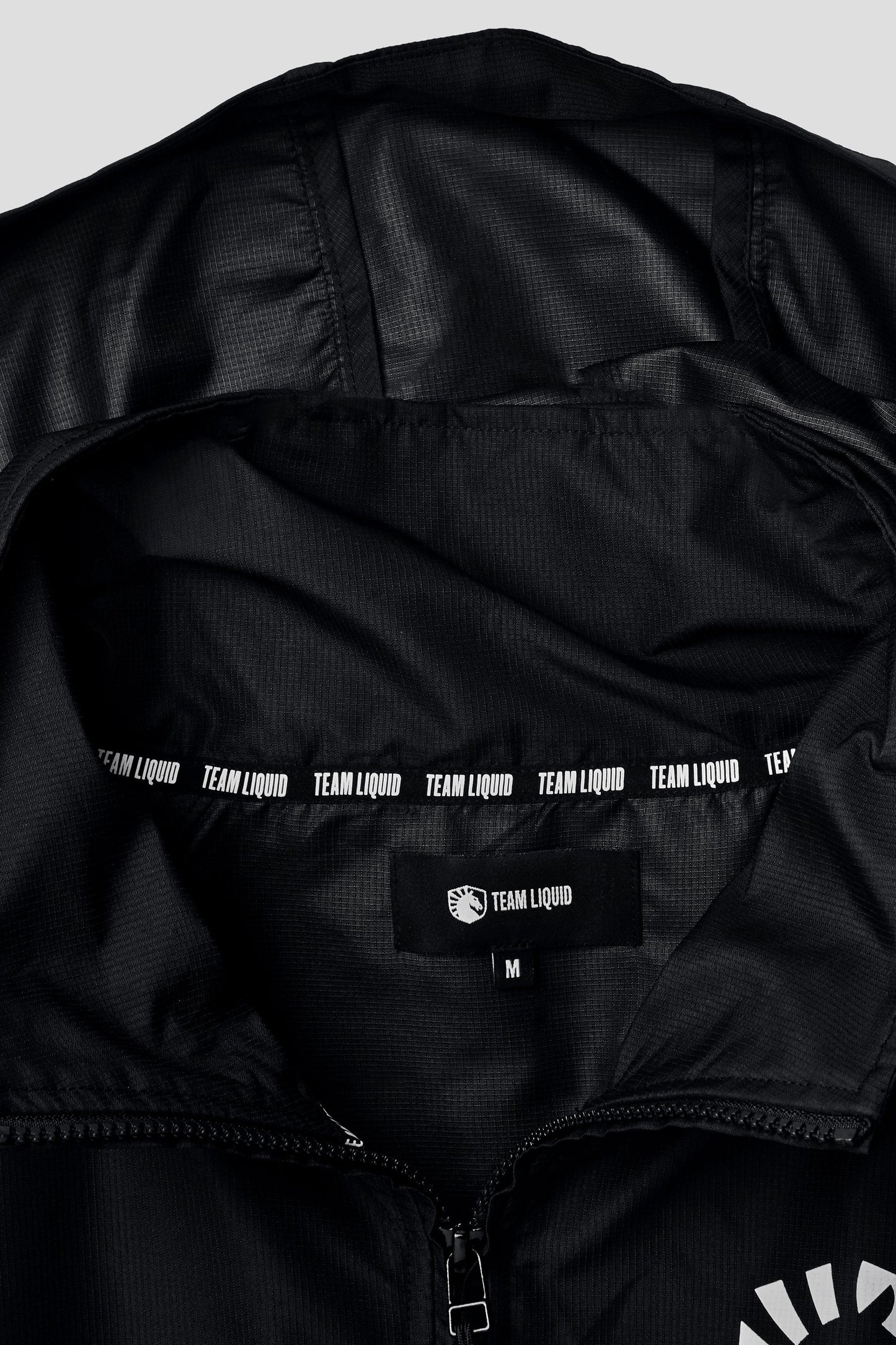 LIQUID PRESTIGE HALF ZIP WINDBREAKER - BLACK - Team Liquid