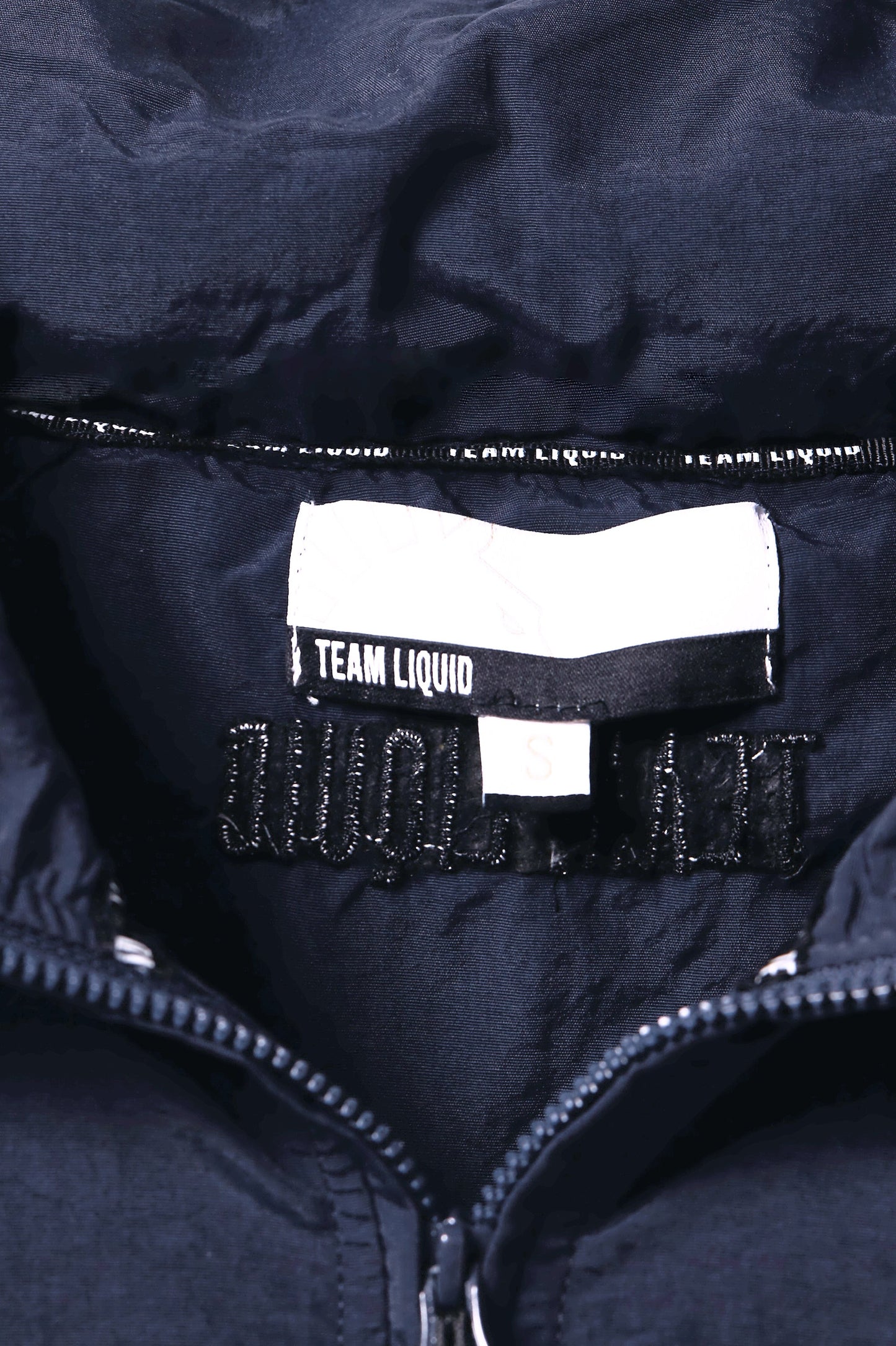 CREST RECYCLED NYLON WINDBREAKER - Team Liquid