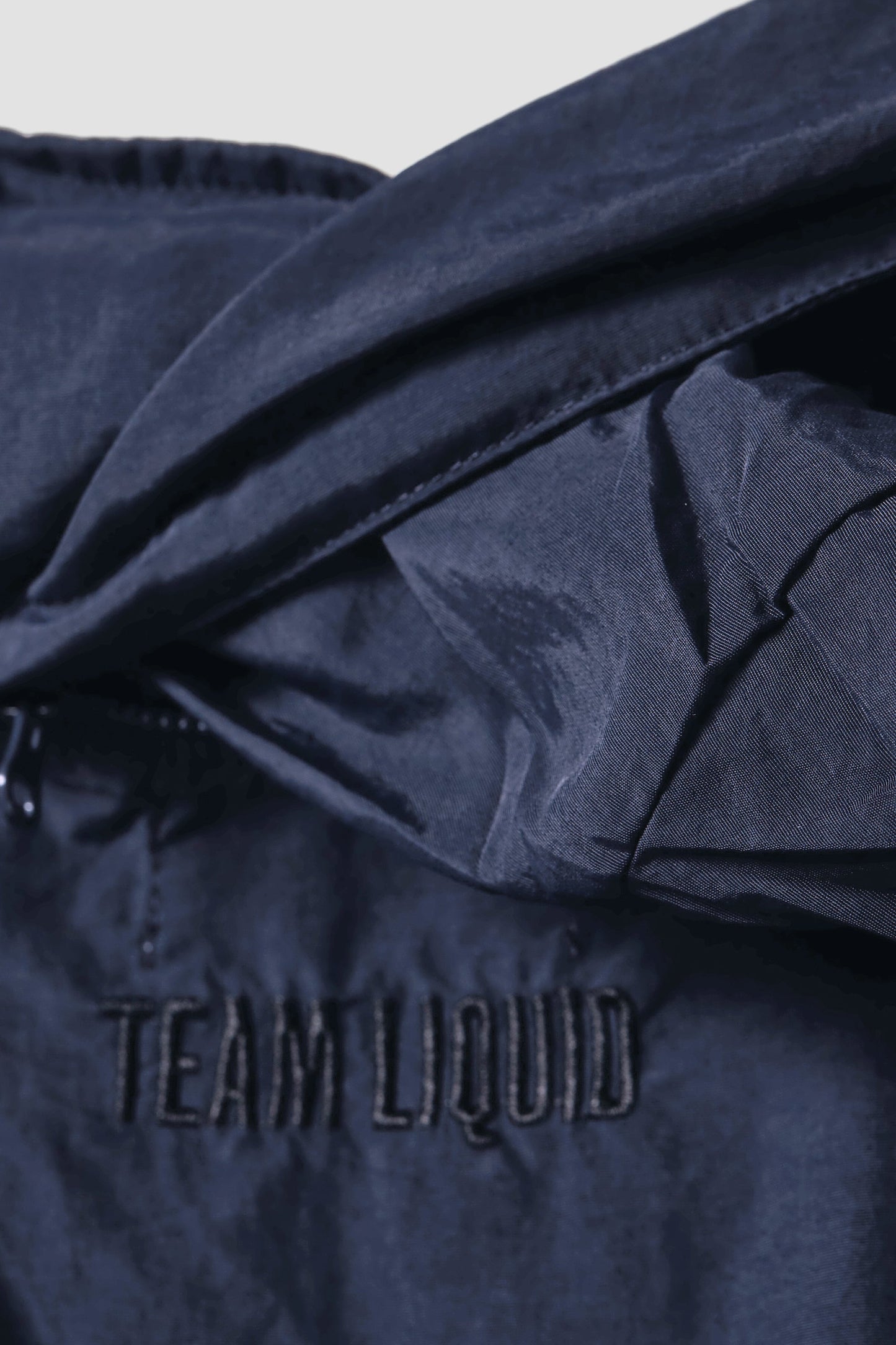 CREST RECYCLED NYLON WINDBREAKER - Team Liquid
