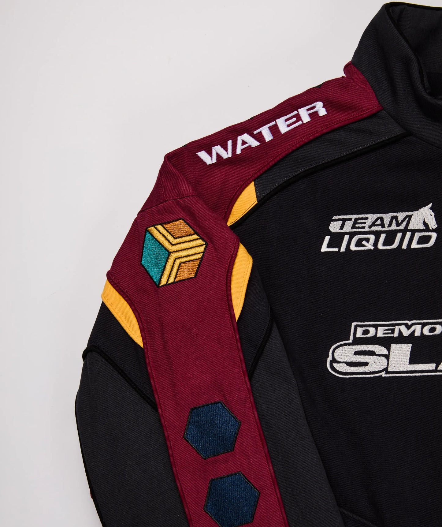 DEMON SLAYER TOMIOKA RACING JACKET - Team Liquid